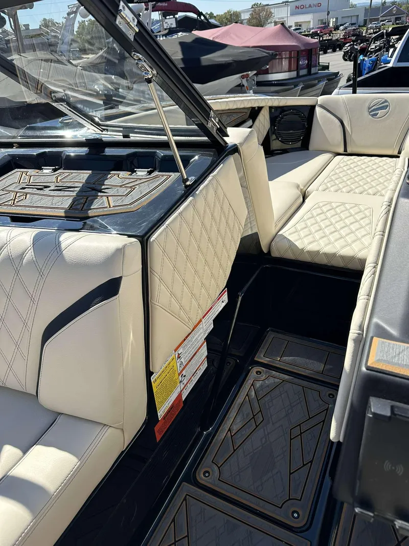 Slide: The Image of 2024 Tigé 24RZX boat interior with luxurious seating and modern design. - 31