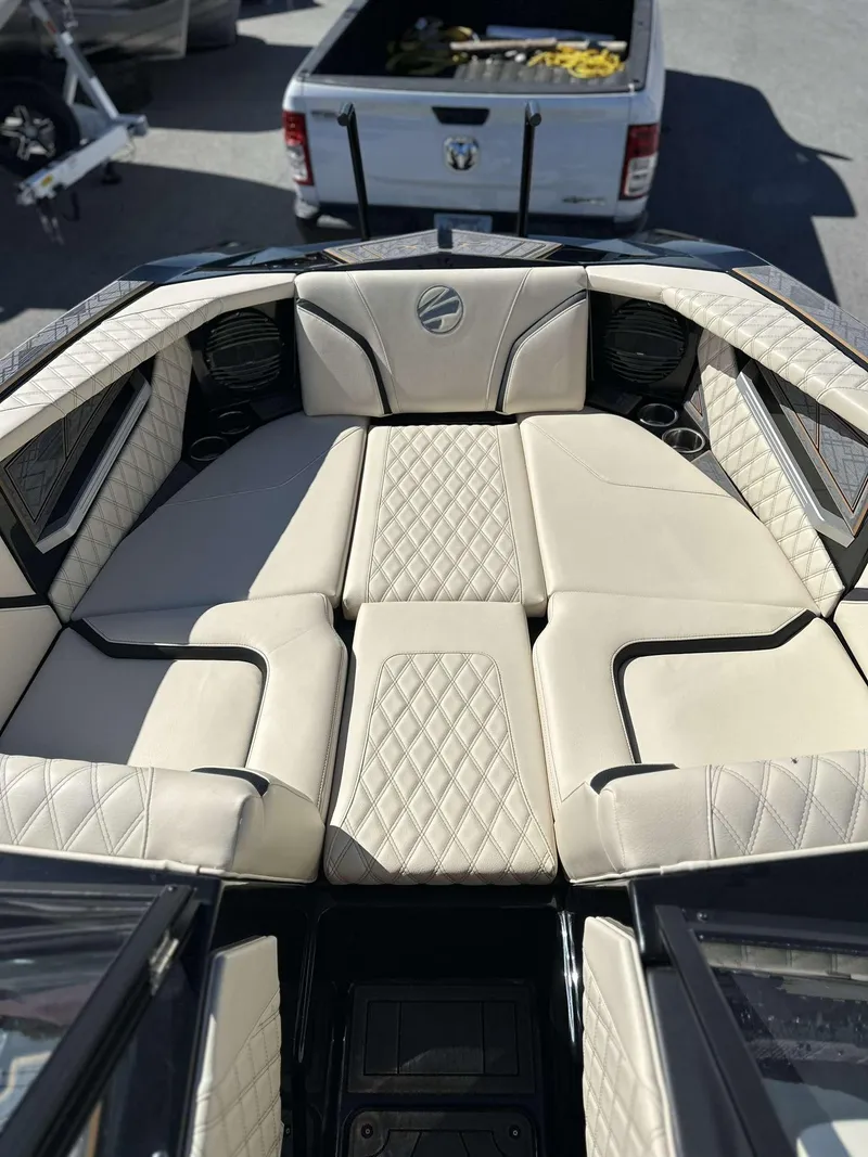Slide: The Image of 2024 Tigé 24RZX boat with luxurious beige seating and diamond stitching. - 32