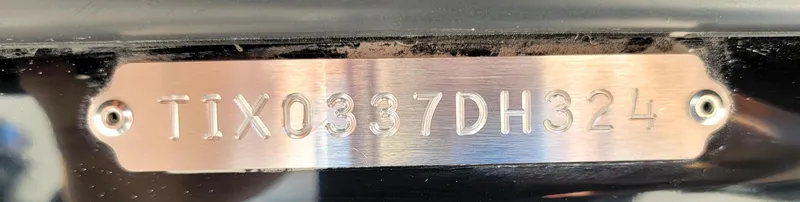 Slide: The Image of 2024 Tigé 24RZX boat hull identification number (HIN) plate. - 36