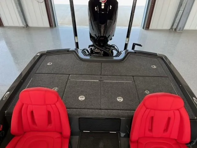 Slide: The Image of 2024 iKon LX21 boat with red seats and rear storage compartments. - 7