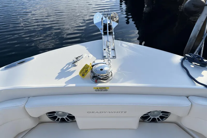 Slide: The Image of 2024 Grady-White Freedom 235 boat bow with anchor and seating. - 23