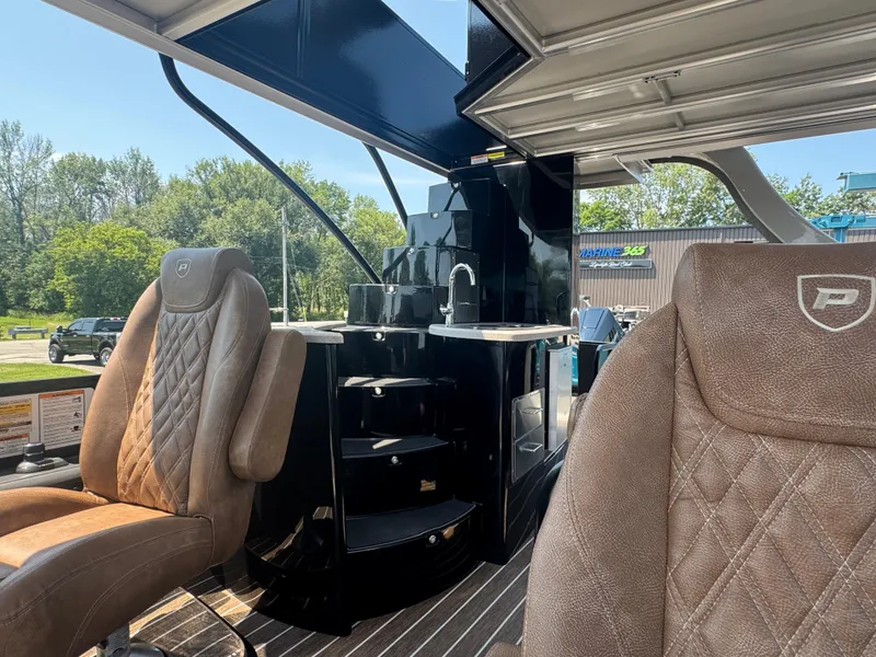 Slide: The Image of Luxurious interior of 2026 Premier Escalante boat with plush seating and modern amenities. - 11