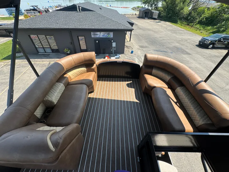 Slide: The Image of Luxurious seating on 2026 Premier Escalante boat with waterfront view. - 15