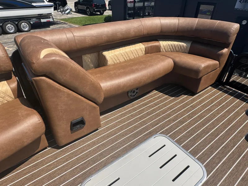 Slide: The Image of Luxurious brown seating on 2026 Premier Escalante boat with striped flooring. - 19