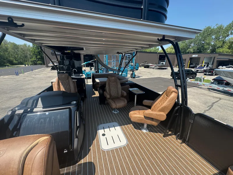 Slide: The Image of Luxurious interior of 2026 Premier Escalante boat with plush seating and sleek design. - 22