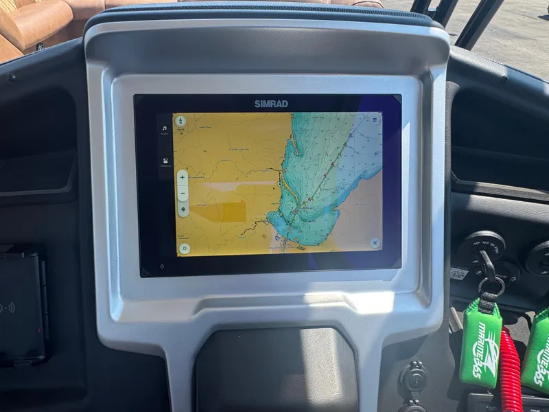 Slide: The Image of Simrad navigation display in 2026 Premier Escalante boat dashboard. - 24