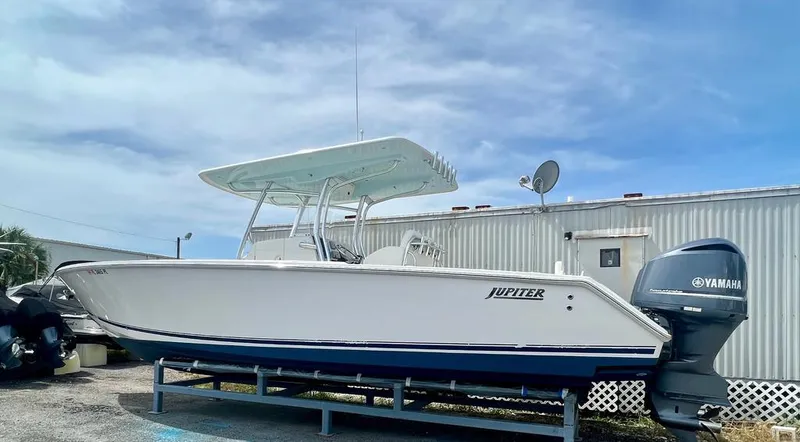 Slide: The Image of 2013 Jupiter 34 Center Console boat with Yamaha outboard motor. - 2