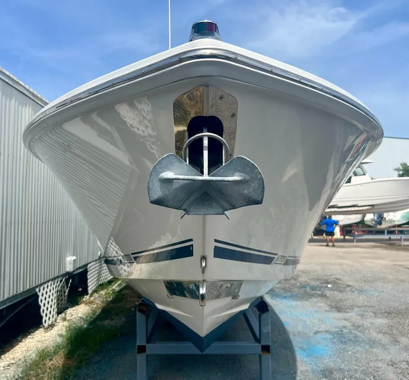 Slide: The Image of 2013 Jupiter 34 Center Console boat front view with anchor. - 4
