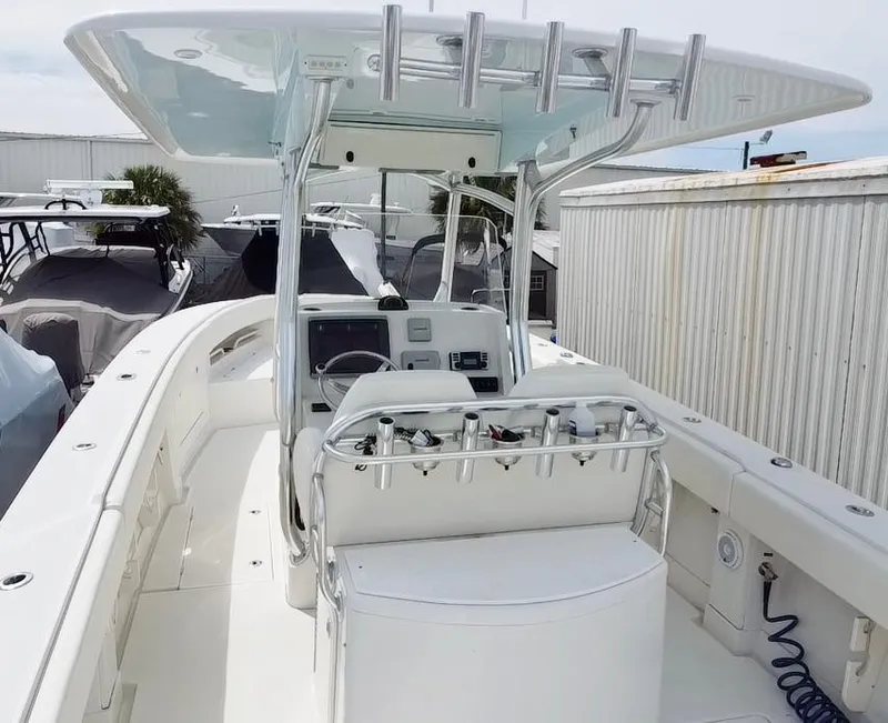 Slide: The Image of 2013 Jupiter 34 Center Console boat with T-top and helm station. - 6