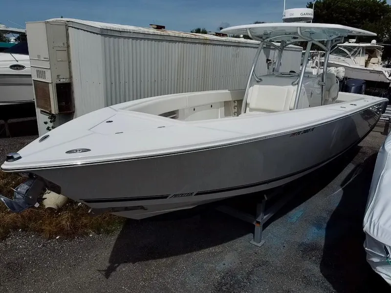 Slide: The Image of 2013 Jupiter 34 Center Console boat in storage yard. - 8