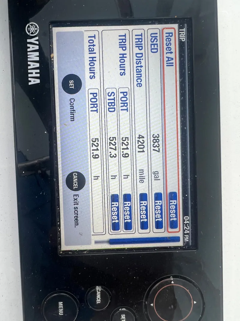 Slide: The Image of Yamaha engine display on a 2013 Jupiter 34 Center Console boat showing trip data. - 9