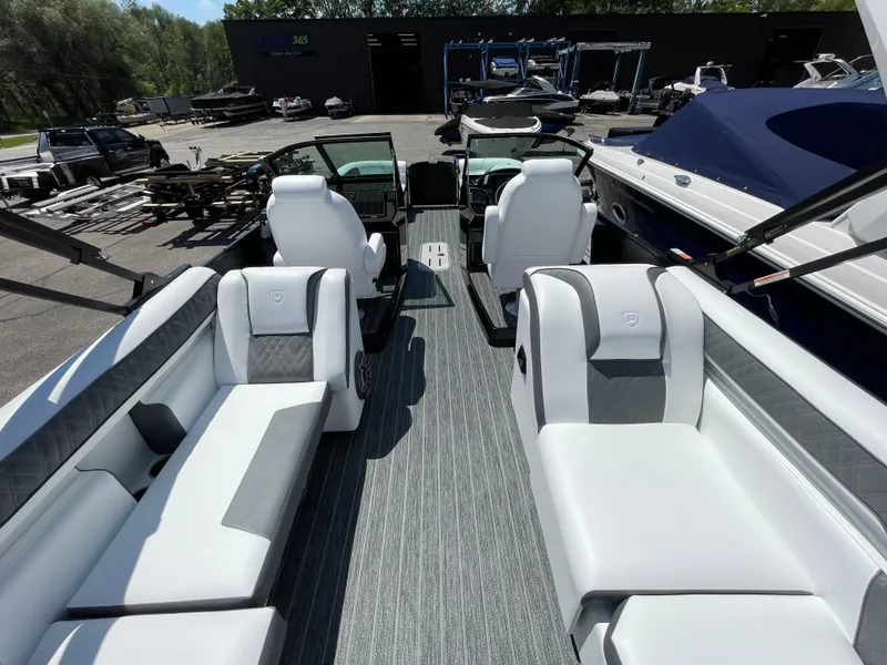 Slide: The Image of 2024 Premier Supersport boat interior with white seating and modern design. - 10