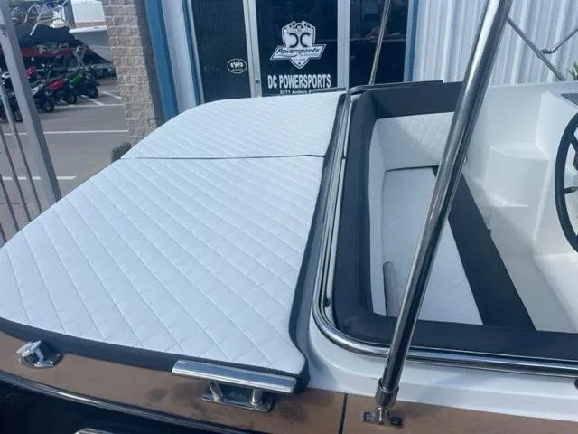 Slide: The Image of 2023 Maxima 620 Retro boat with white quilted seating at DC Powersports. - 13