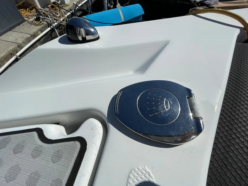 Slide: The Image of Close-up of 2020 Scarab 285 ID boat deck with chrome fittings. - 28