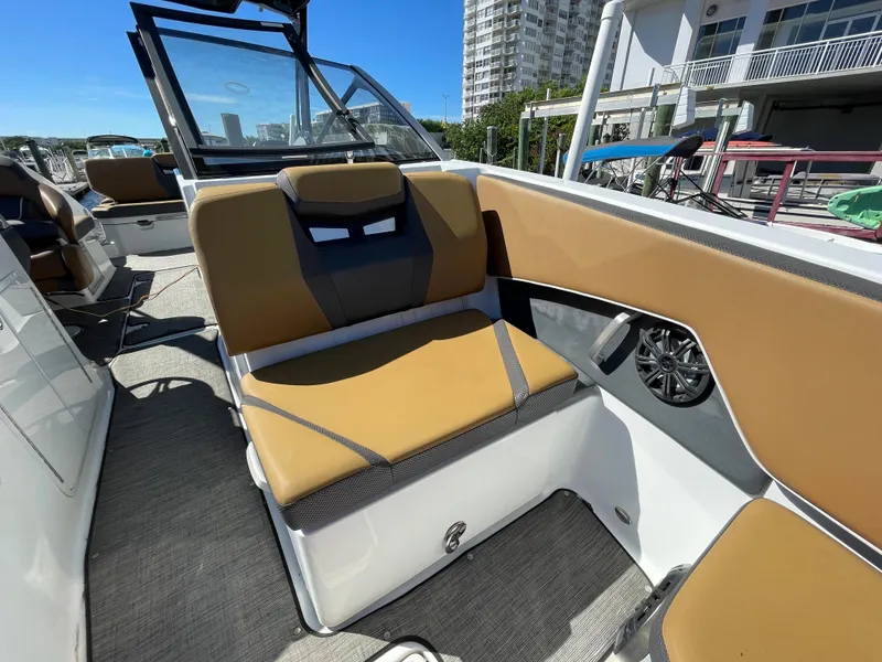 Slide: The Image of 2020 Scarab 285 ID boat interior with tan and gray seating. - 33