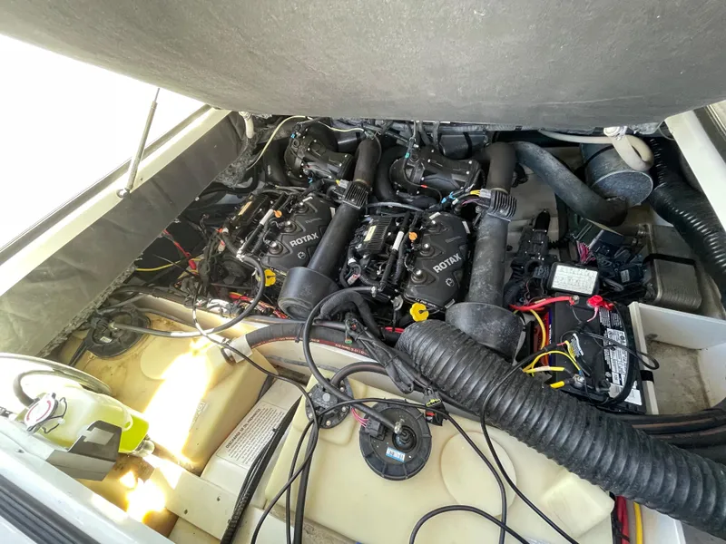 Slide: The Image of Engine compartment of a 2020 Scarab 285 ID boat with Rotax engines. - 36