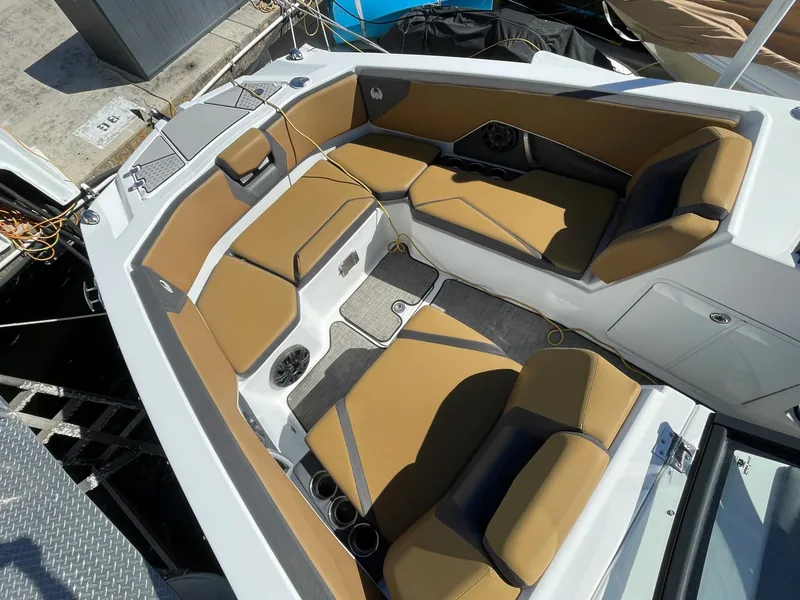 Slide: The Image of 2020 Scarab 285 ID boat interior with tan and black seating. - 5