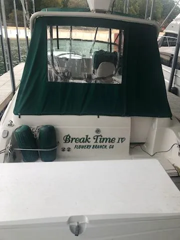 Slide: The Image of 1997 Regal 292 Commodore boat docked, named Break Time IV from Flowery Branch, GA. - 8