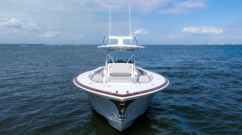 Slide: The Image of 2025 Valhalla Boatworks V-41 on open water, front view, clear sky. - 2