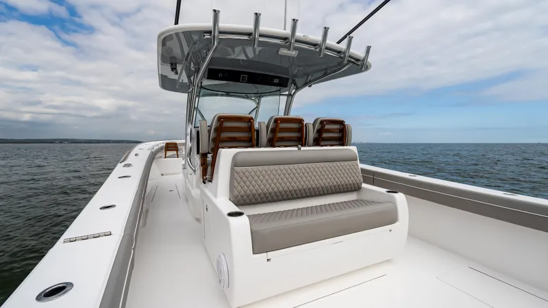 Slide: The Image of 2025 Valhalla Boatworks V-41 on open water, featuring sleek seating and modern design. - 20