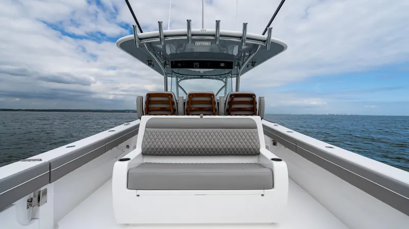 Slide: The Image of 2025 Valhalla Boatworks V-41 on open water, featuring sleek seating and modern design. - 22