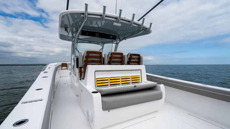 Slide: The Image of 2025 Valhalla Boatworks V-41 on open water, featuring sleek design and modern seating. - 23
