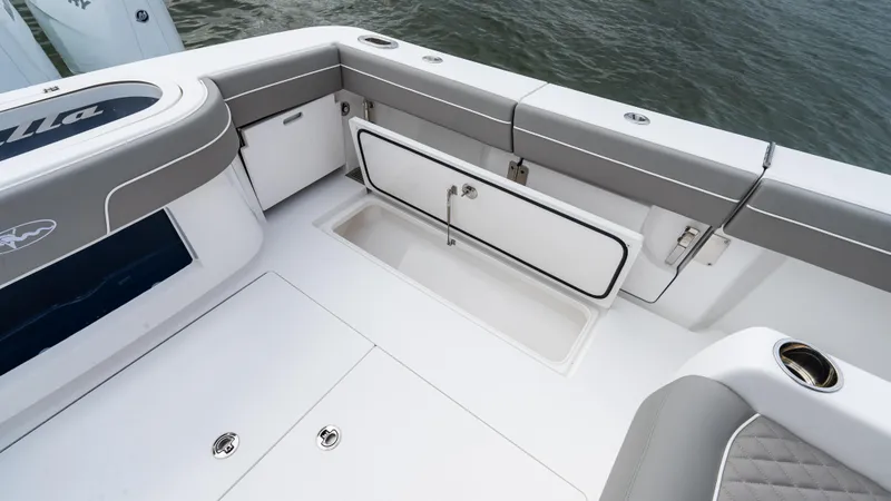 Slide: The Image of 2025 Valhalla Boatworks V-41 interior with storage compartment, featuring sleek design and modern amenities. - 24