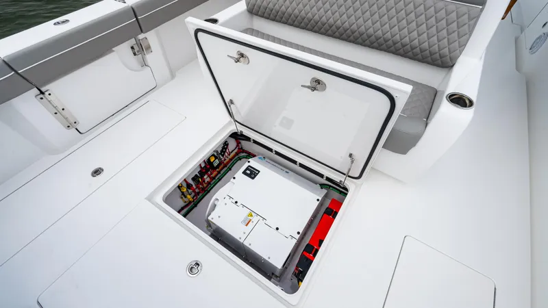 Slide: The Image of 2025 Valhalla Boatworks V-41 open hatch showing interior components and seating area. - 25
