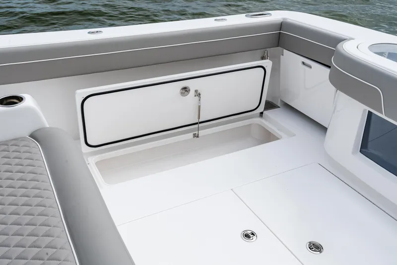 Slide: The Image of 2025 Valhalla Boatworks V-41 interior with storage compartment and seating. - 26