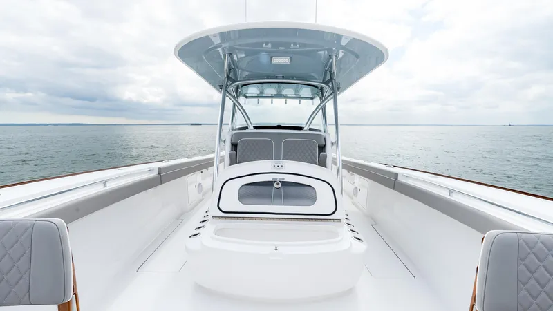 Slide: The Image of 2025 Valhalla Boatworks V-41 on open water, showcasing sleek design and spacious deck. - 40