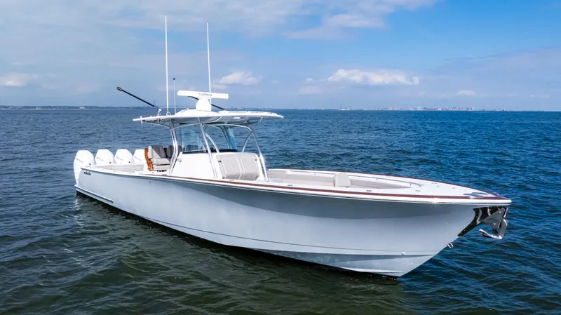 Slide: The Image of 2025 Valhalla Boatworks V-41 on open water, showcasing sleek design and powerful engines. - 5