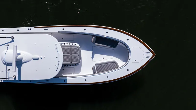 Slide: The Image of 2025 Valhalla Boatworks V-41, aerial view, sleek design, white hull, spacious deck. - 10