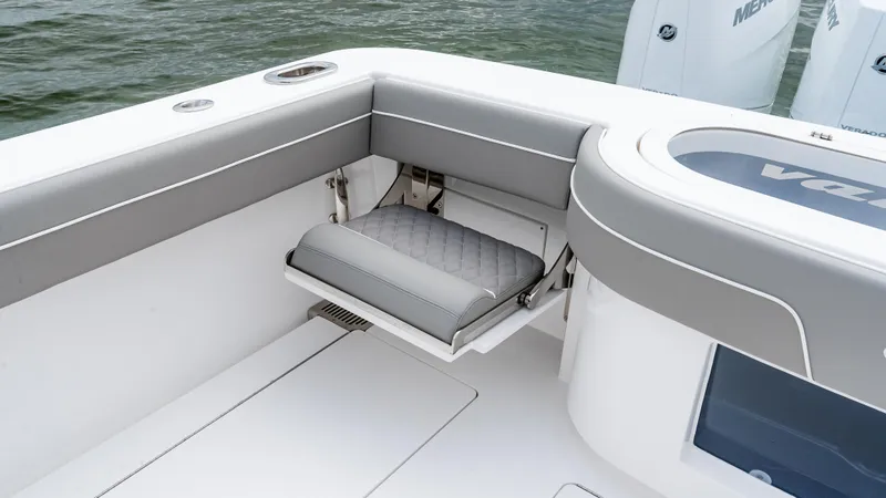 Slide: The Image of 2025 Valhalla Boatworks V-41 interior with foldable seat and sleek design. - 18