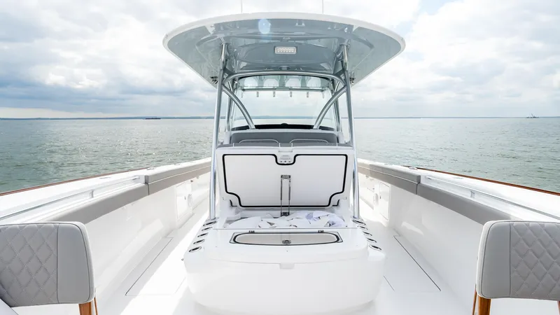 Slide: The Image of 2025 Valhalla Boatworks V-41 on open water, showcasing sleek design and spacious deck. - 42