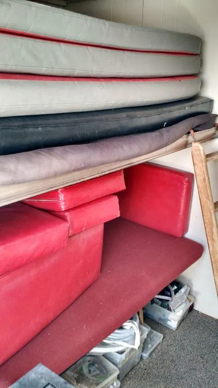 Slide: The Image of Cushions and mattresses stored in a 1978 Kayot houseboat interior. - 25
