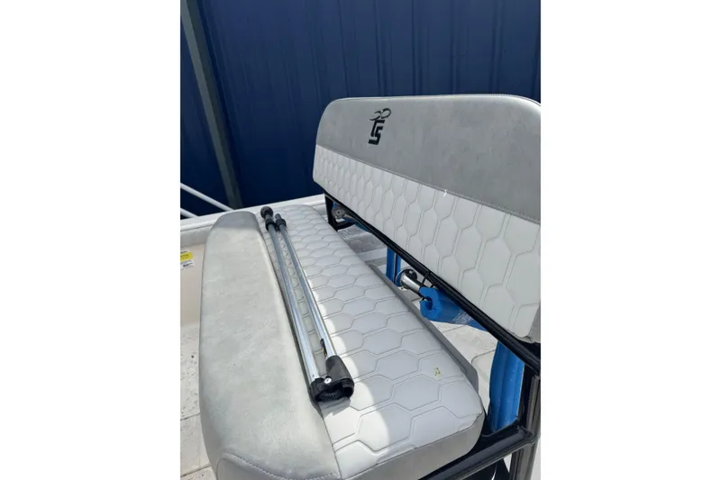 Slide: The Image of 2026 Carolina Skiff 21 LS boat seat with hexagonal pattern and logo detail. - 9