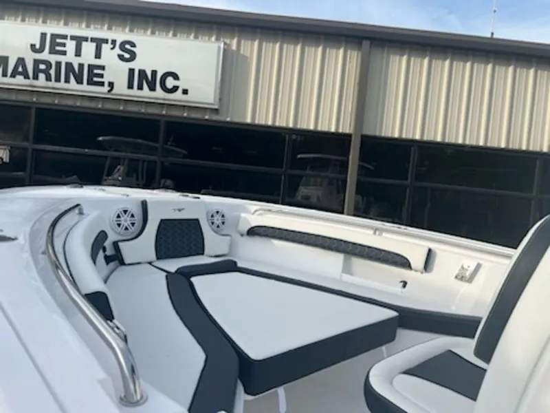 Slide: The Image of 2024 Tidewater 232 LXF boat interior at Jett's Marine, Inc. showroom. - 4