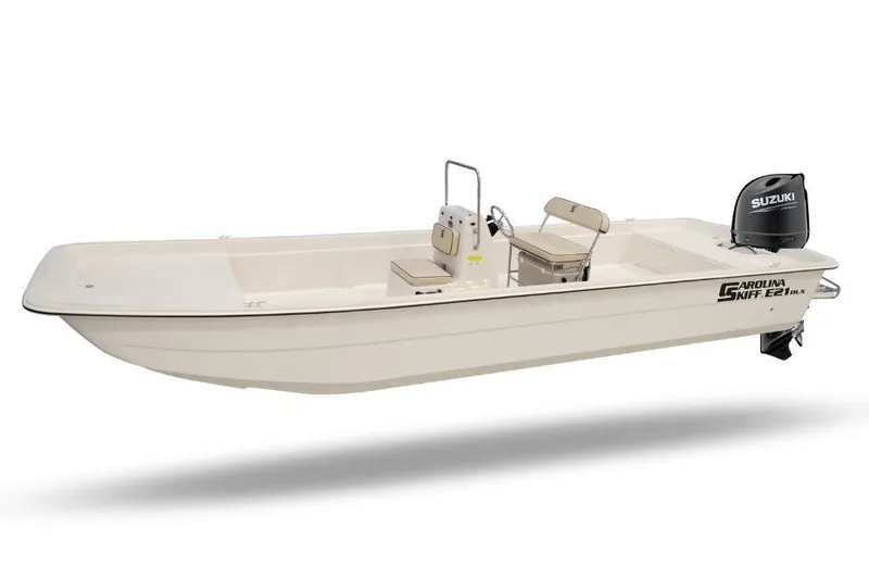 Slide: The Image of 2026 Carolina Skiff E18 JVX CC boat with Suzuki outboard motor. - 7