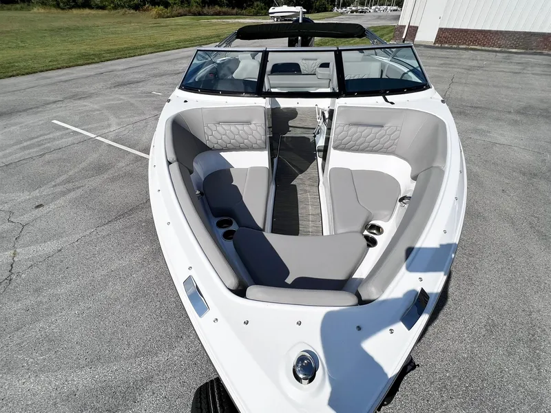 Slide: The Image of 2023 Four Winns H1 OB boat with spacious seating and modern design. - 14