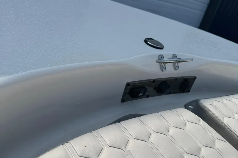 Slide: The Image of 2025 Carolina Skiff 192 JLS boat interior detail with seating and hardware. - 10