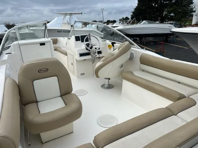 Slide: The Image of 2020 Key West 203 DFS boat interior with beige and white seating. - 5