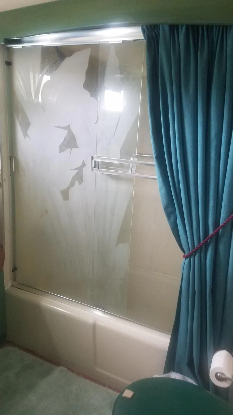 Slide: The Image of Bathroom with frosted glass shower door on 1974 Stephens 68 Motor Yacht. - 18