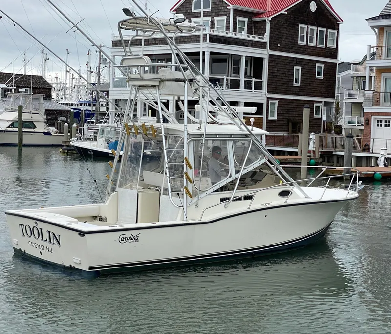 Slide: The Image of 2004 Carolina Classic 28 boat docked in marina, Cape May, NJ. - 13