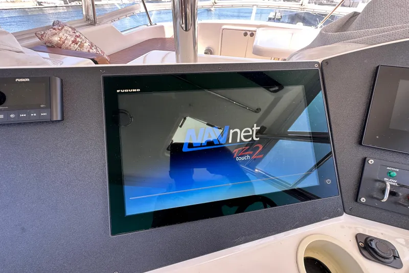 Slide: The Image of Control panel of 2005 Riviera 47 Open Flybridge with Furuno NavNet TZtouch2 display. - 19