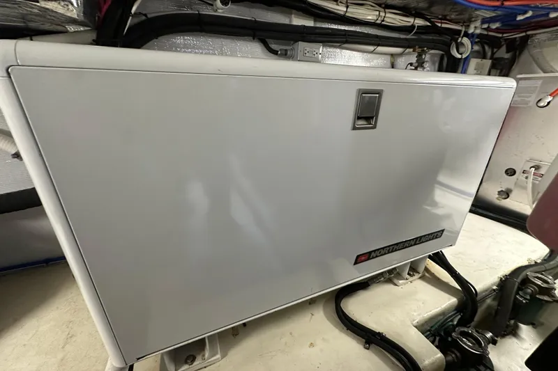 Slide: The Image of Northern Lights generator in 2005 Riviera 47 Open Flybridge engine room. - 23