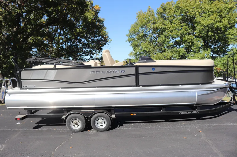 The Image of 2024 Premier 250 SunSation RF pontoon boat on a trailer. - 0