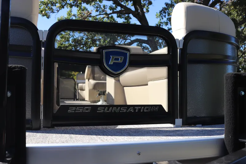 Slide: The Image of 2024 Premier 250 SunSation RF pontoon boat interior with luxury seating. - 2