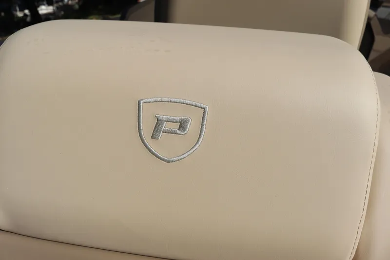 Slide: The Image of 2024 Premier 250 SunSation RF beige leather seat with embroidered logo. - 20