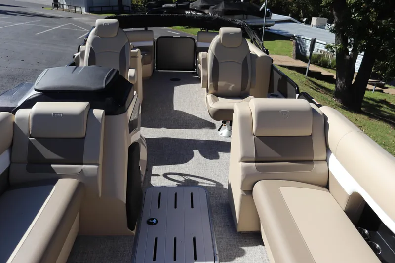 Slide: The Image of 2024 Premier 250 SunSation RF pontoon boat with luxurious seating and spacious layout. - 5