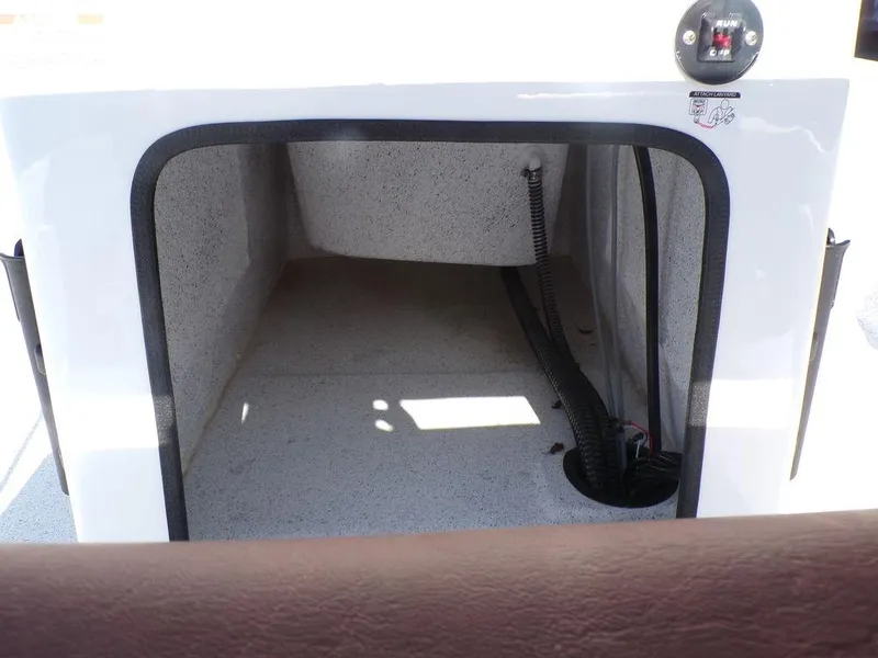 Slide: The Image of 2024 Custom 1800 Tunnel boat storage compartment with wiring. - 17